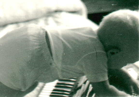 ralph playing accordian abt jul 1956  9 mo old