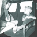 ralph in serious conversation with friend on train-oct 1959  Number 5